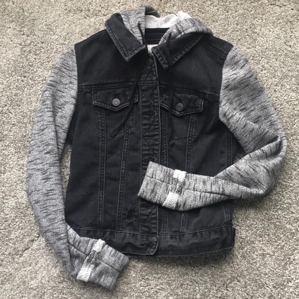 Black denim jacket with sweatshirt hood and sleeve